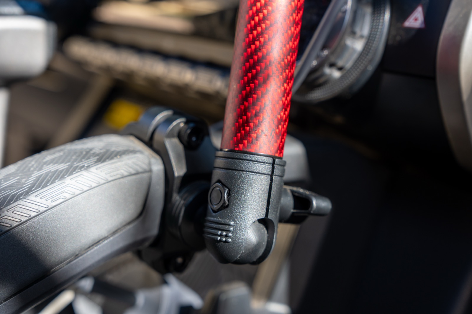 Bulletpoint grab handle mount clamped to the factory Tacoma grab handle