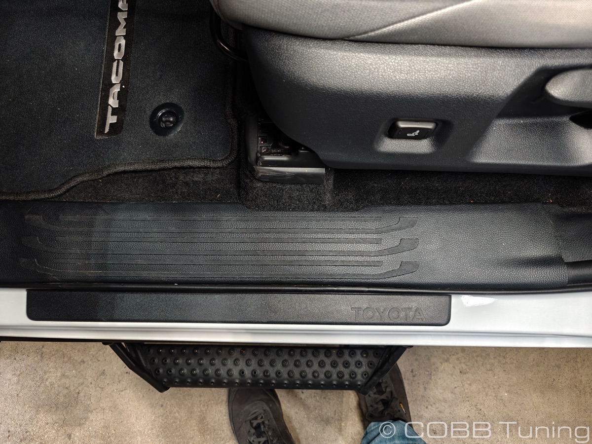 Tacoma door sill plate before removal