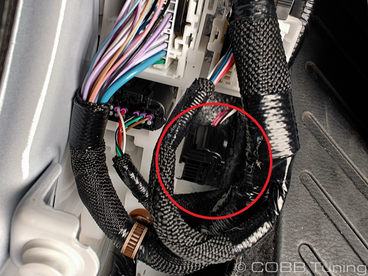 Close-up of the bypass connector highlighted with red circle