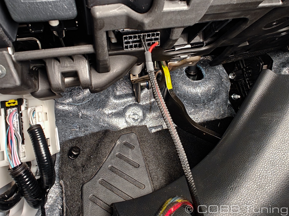 OBD-II port area under the Tacoma dash — the AP plugs in here