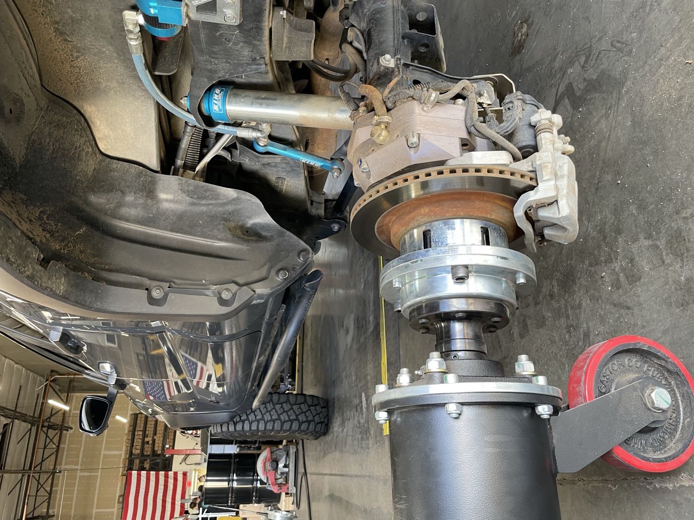 Portal axles and King shocks visible under the Tacoma