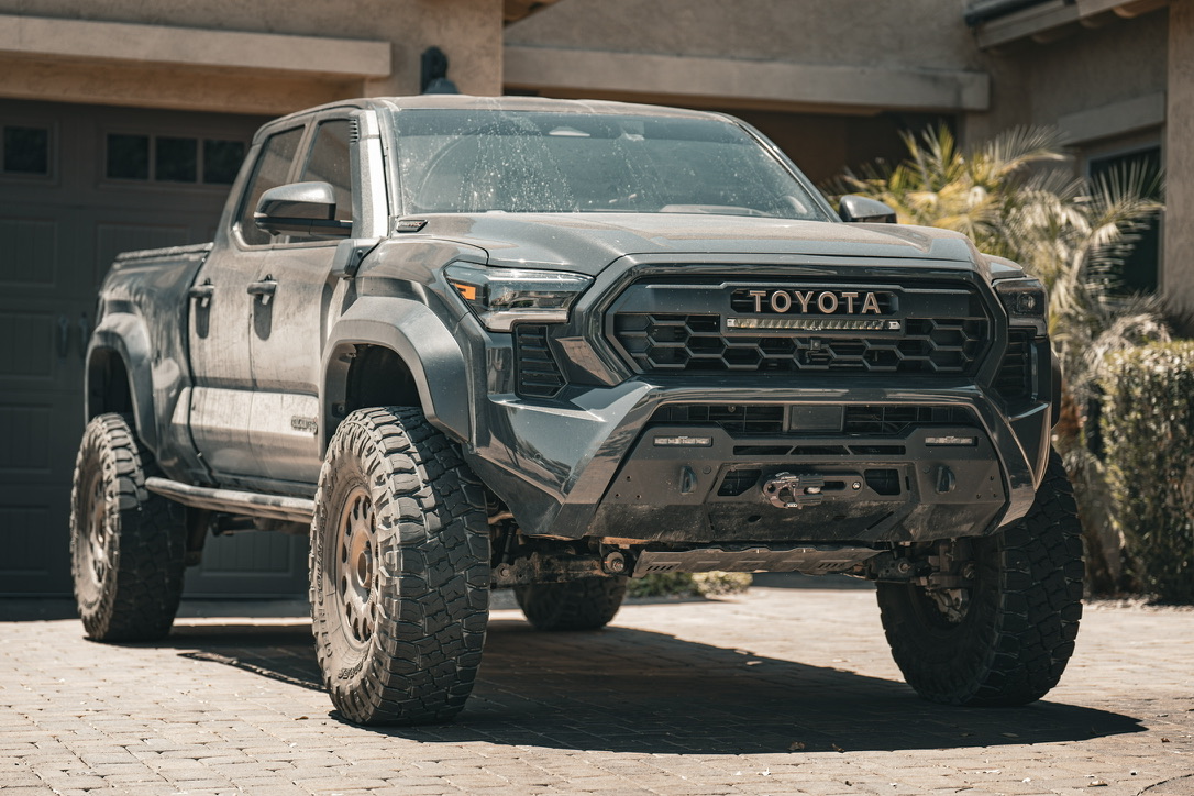 2024 Tacoma Trailhunter on 37s, dusty from a desert run