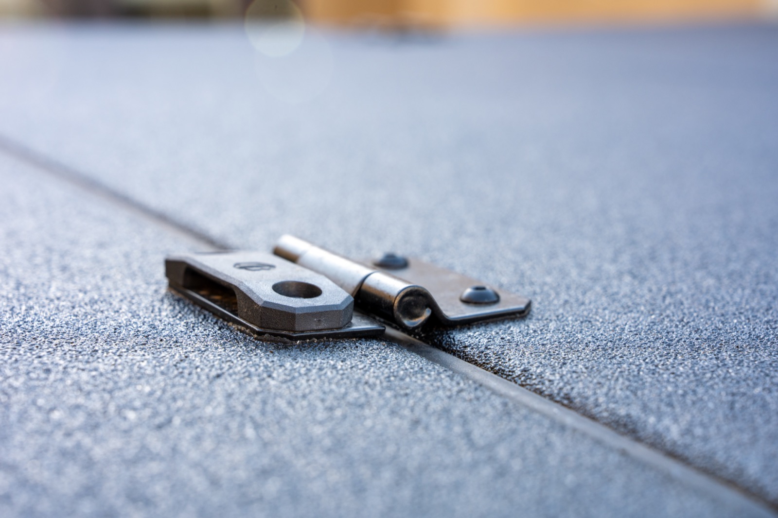 Stainless hinge and anchor plate hardware on the Switchback 2.0 panel