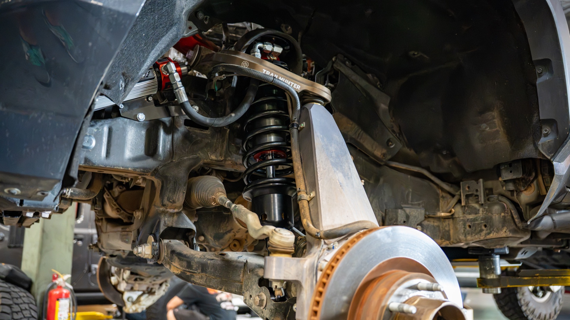 Fox 3.2 Live Valve front coilover seated in the coil bucket of my Tacoma, upper control arm and tie rod reconnected — photo: SDHQ Off Road