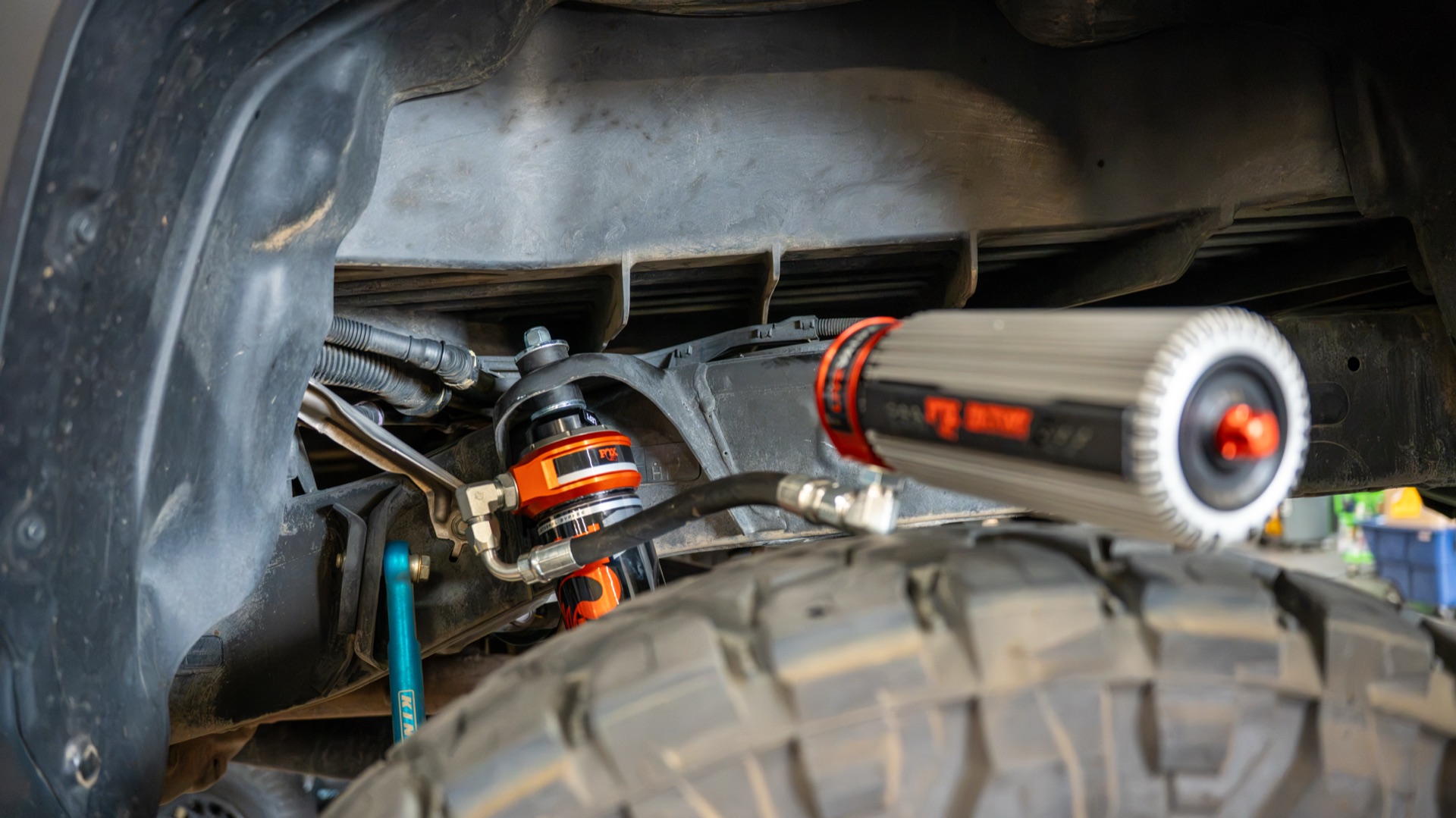 Fox 3.2 Live Valve rear shock installed on my Tacoma, stem top seated and the reservoir with its solenoid running over the 37-inch Toyo — photo: SDHQ Off Road