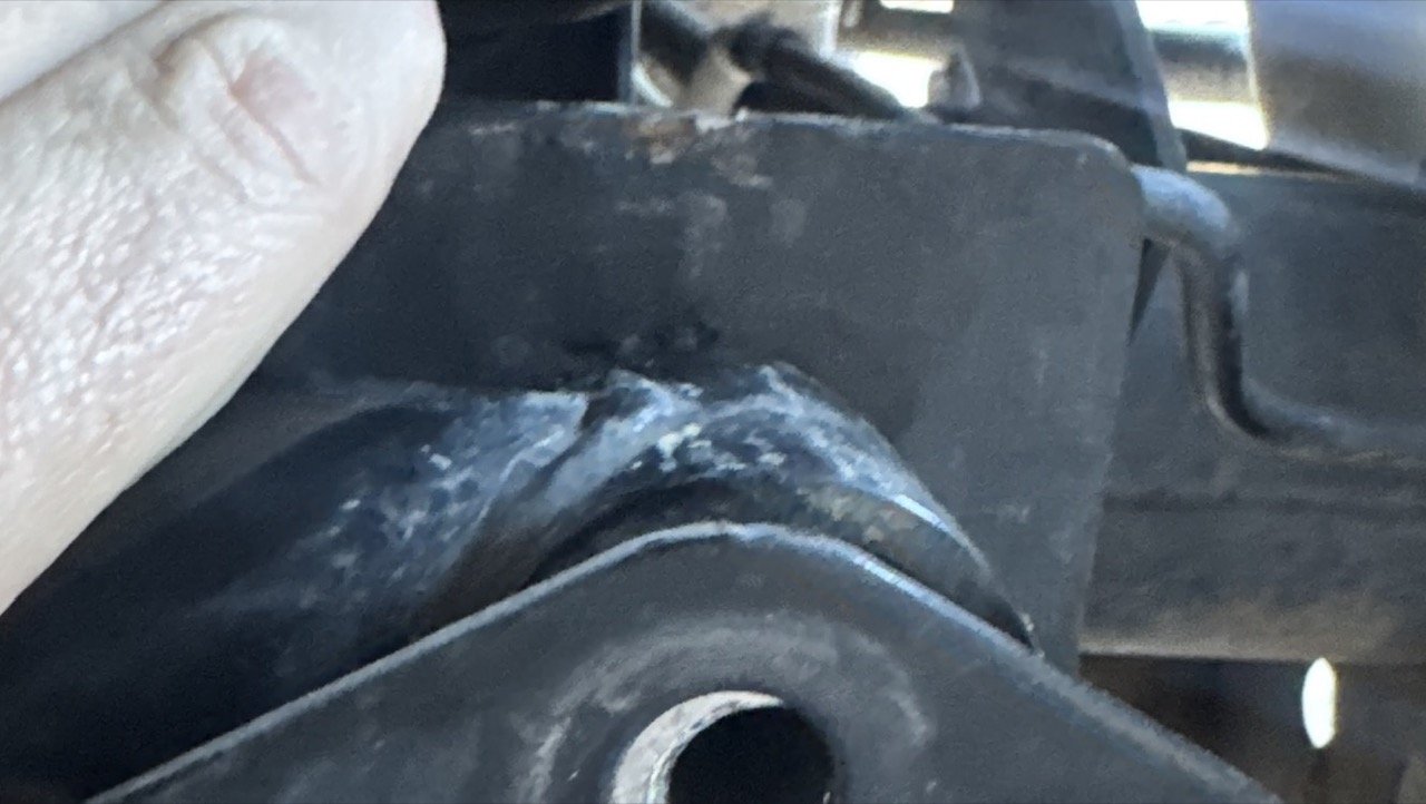 Close-up of 74Weld vulcanized rubber flex joint mounting bracket