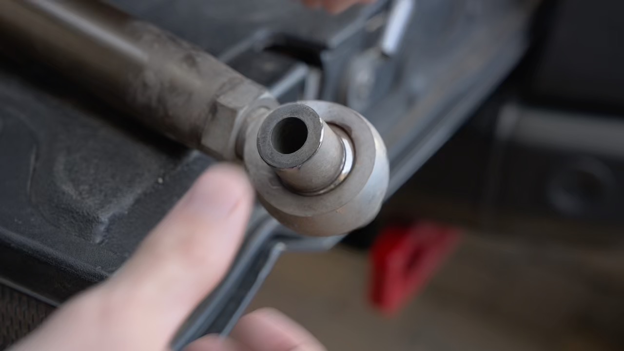 Close-up of a Heim joint on the old chromoly suspension link