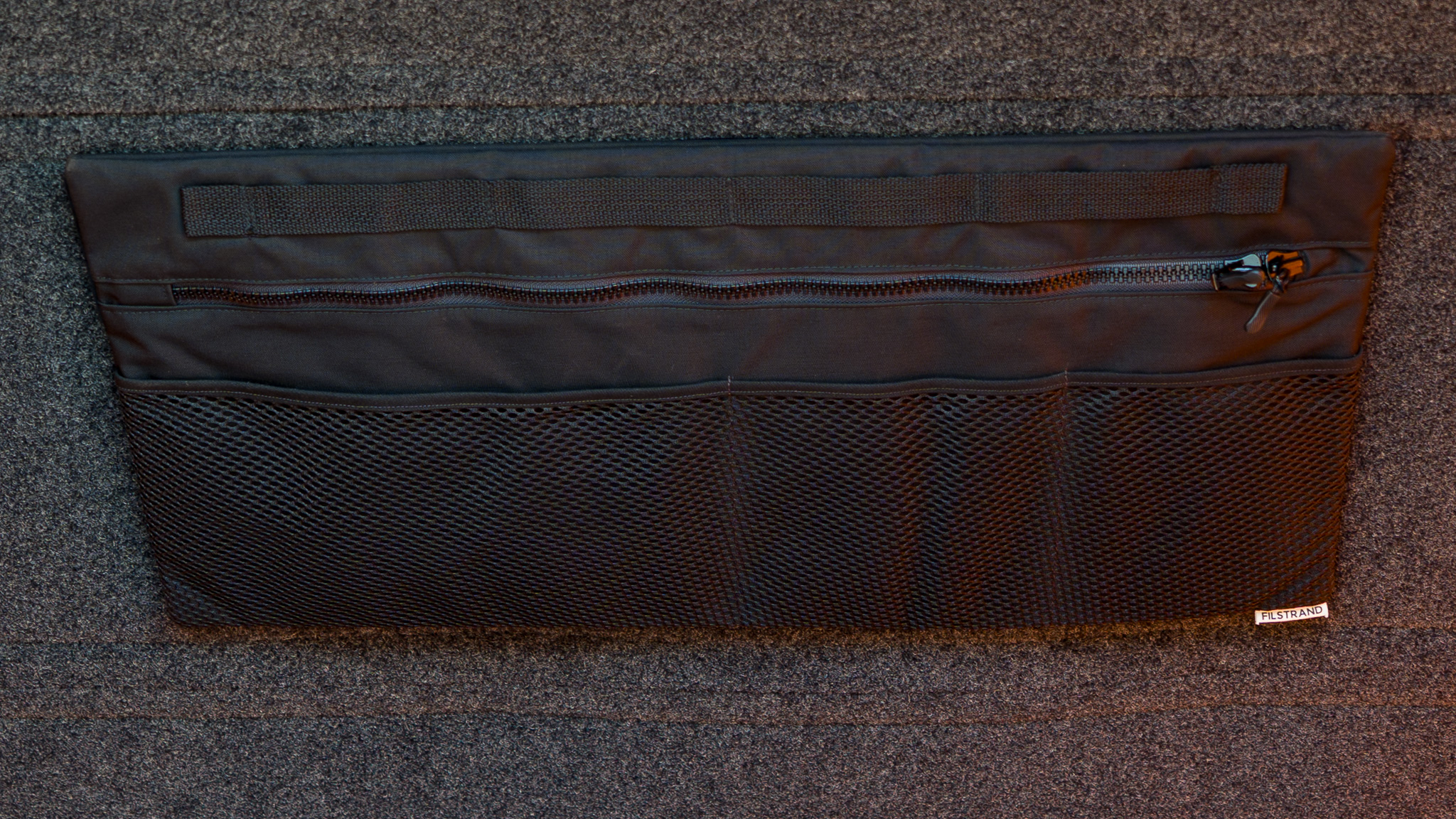 Filstrand Upper Decker ceiling organizer with mesh pockets and zippered storage mounted inside the GFC