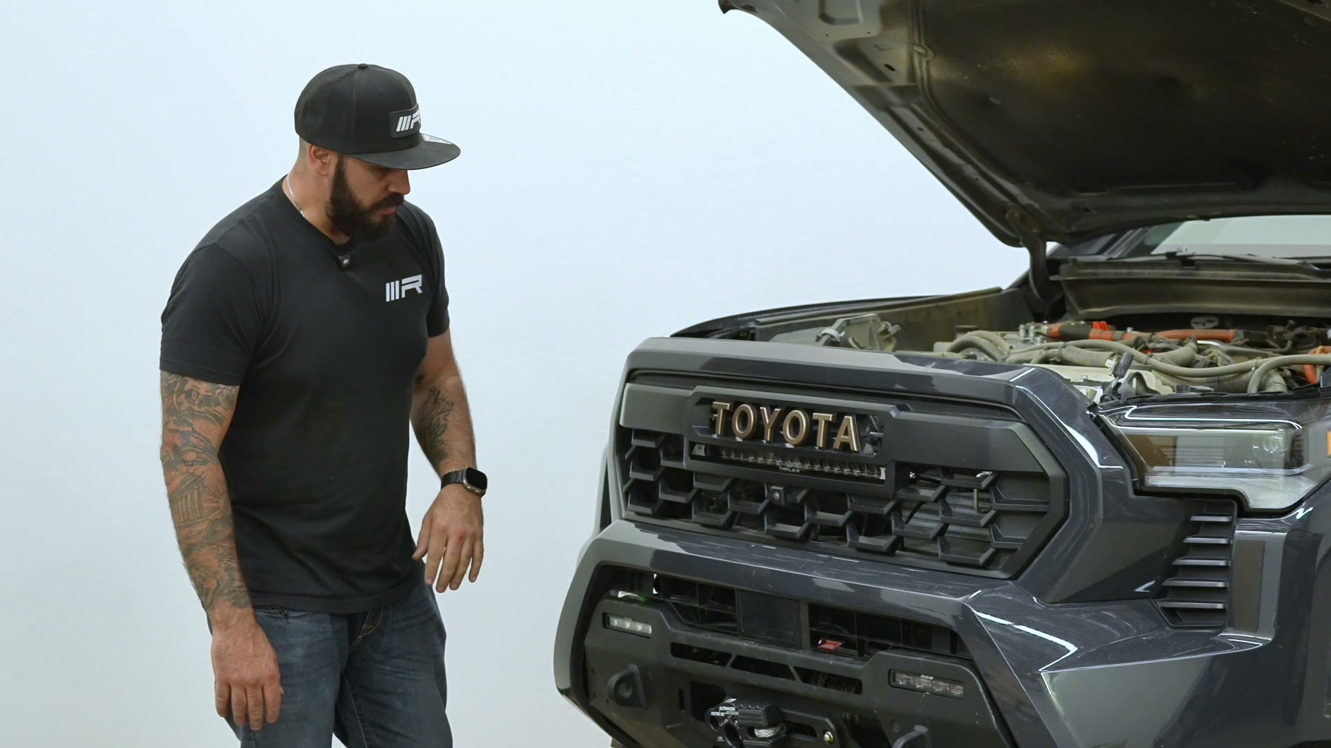 Completed Triple-R Linear-18 grille installation on Tacoma Trailhunter