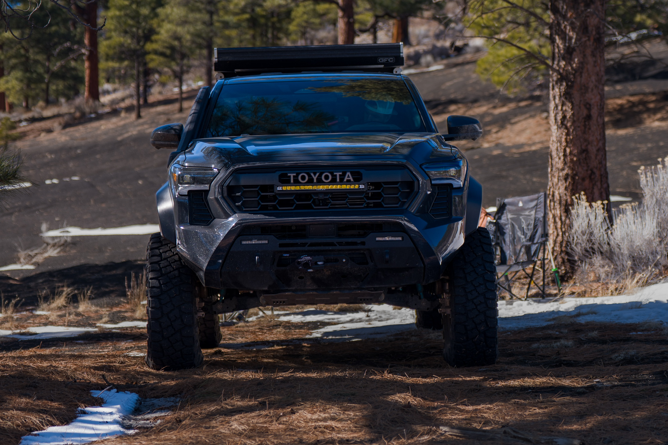 2024 Tacoma Trailhunter with Triple-R Linear-18 Elite Plus glowing amber behind the heritage grille